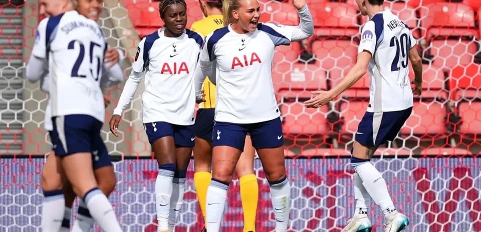 Tottenham players celebrating a goal during match