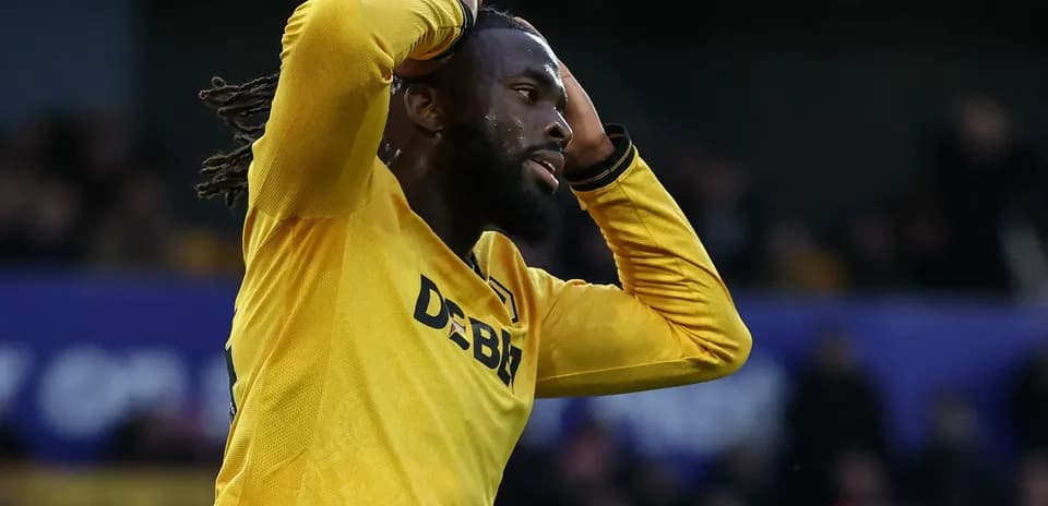 Player in yellow shirt reacting during match