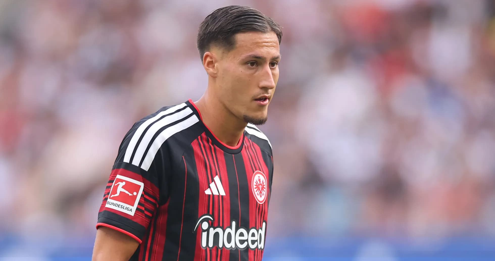 Player in Eintracht Frankfurt jersey during match