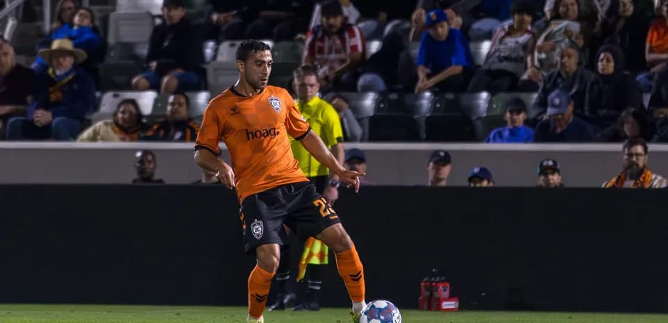 Player dribbling the ball during match