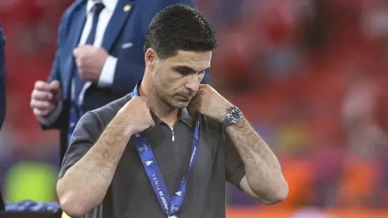 Coach adjusting his lanyard after a match