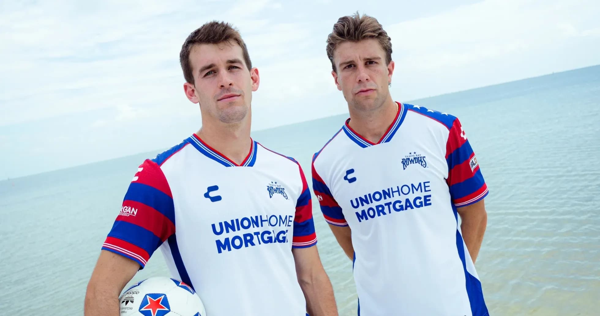 Tampa Bay Rowdies players posing with soccer ball