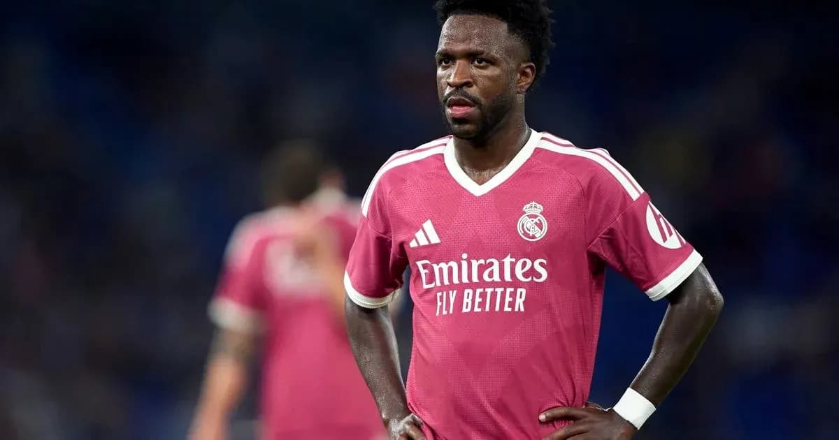 Player wearing pink Real Madrid jersey during match