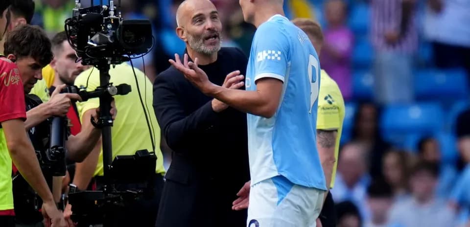 Coach discussing strategy with player during match