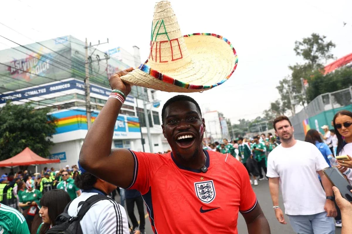 Fan in England jersey wearing sombrero at event