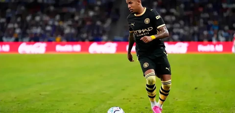Player dribbling ball on the field during match