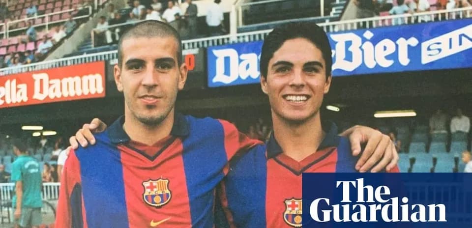 Two young football players in Barcelona jerseys posing together