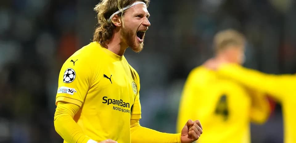Goalkeeper celebrating during UEFA Champions League match