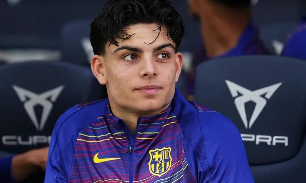 Player sitting on bench during match
