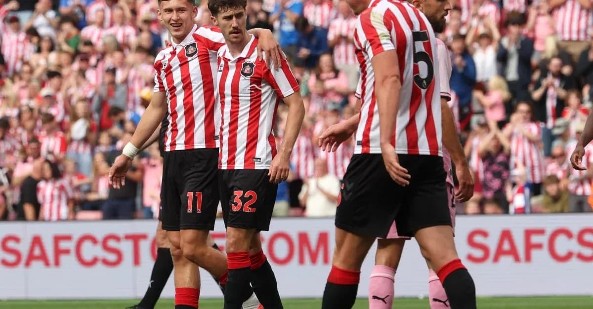 Sunderland players celebrating a goal on the pitch