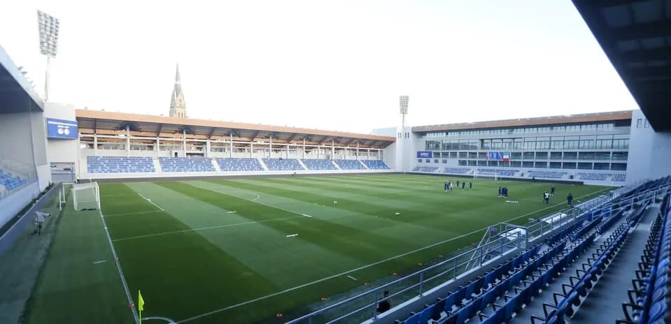 View of training pitch at stadium with players