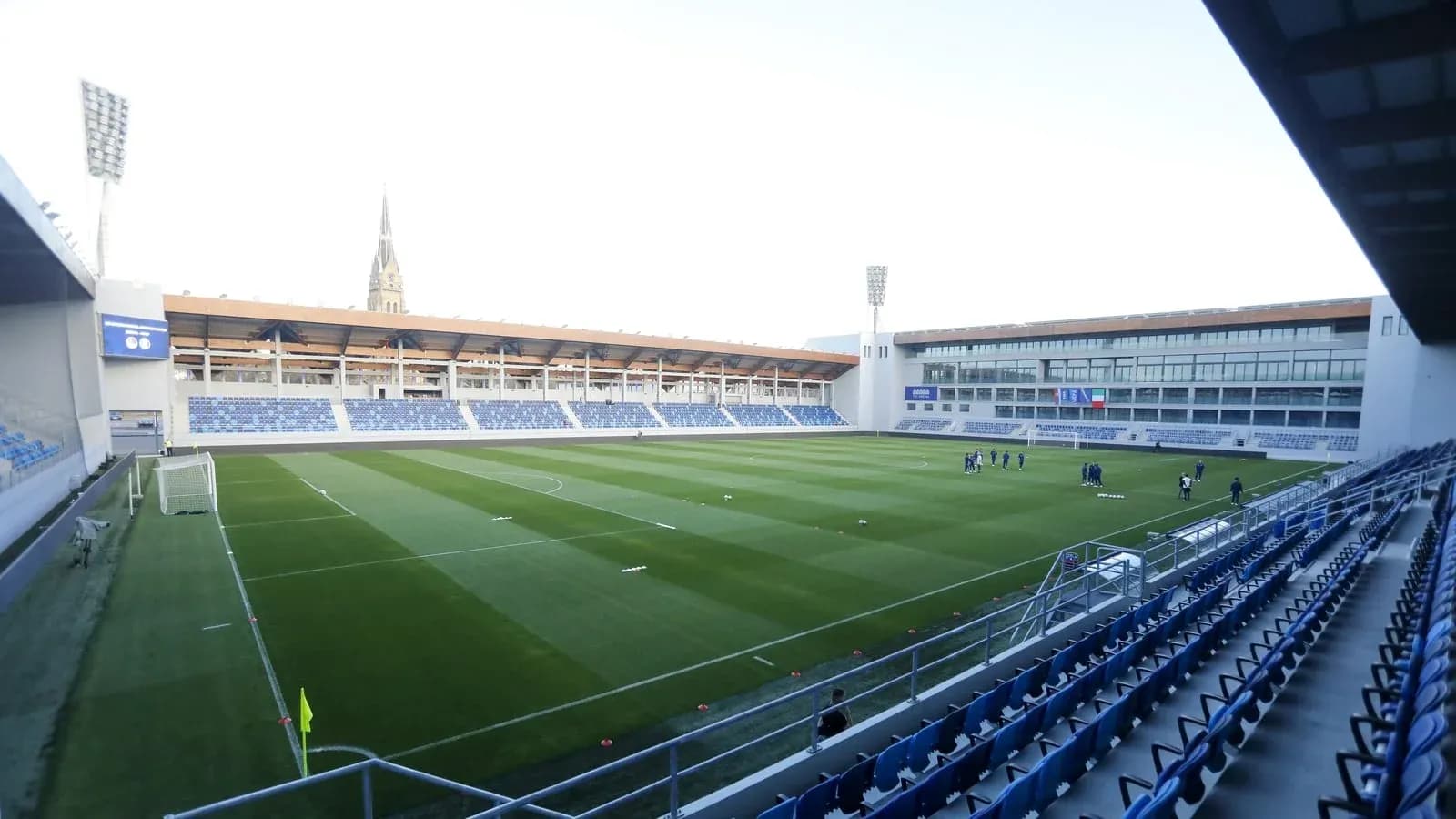 View of training pitch at stadium with players