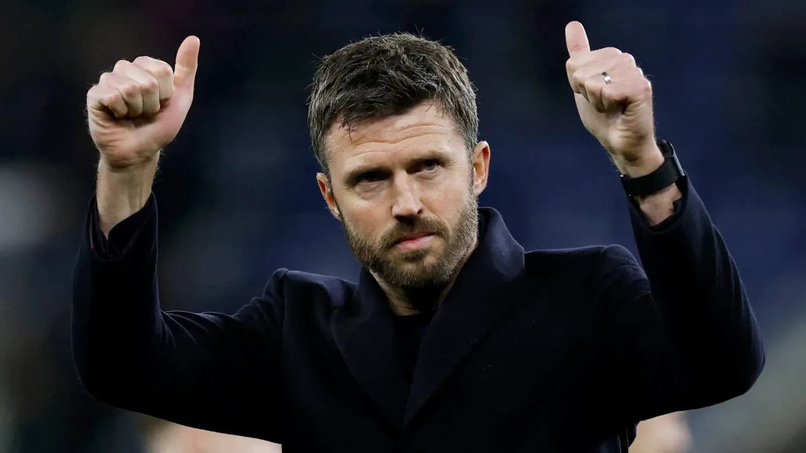 Man giving thumbs up after match