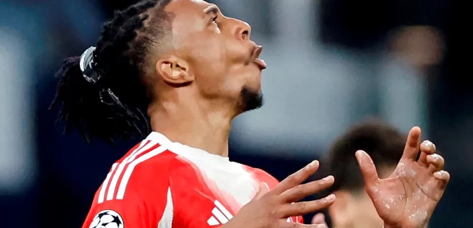 Player celebrating with hands raised during match
