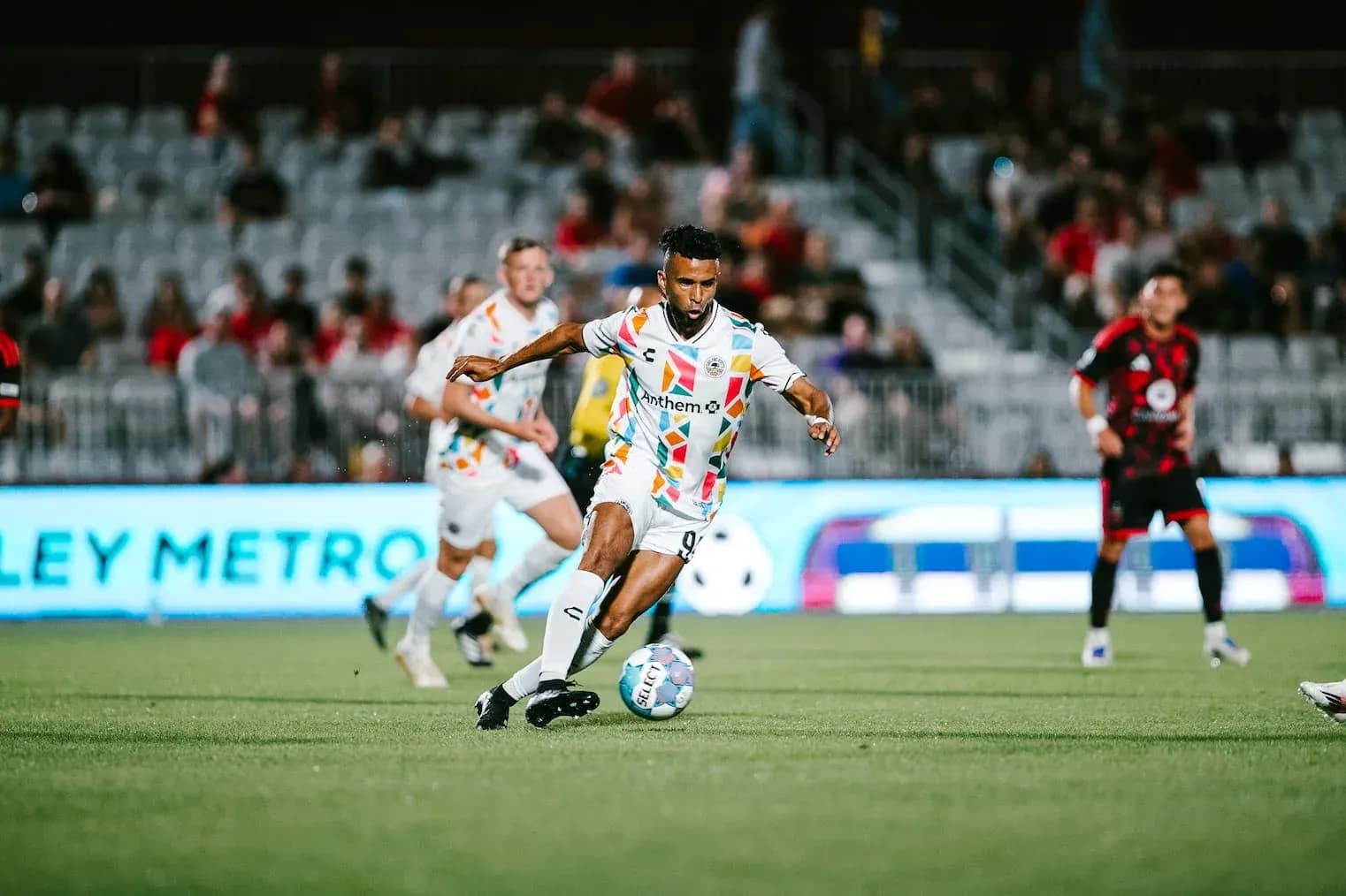 Player dribbling the ball during match