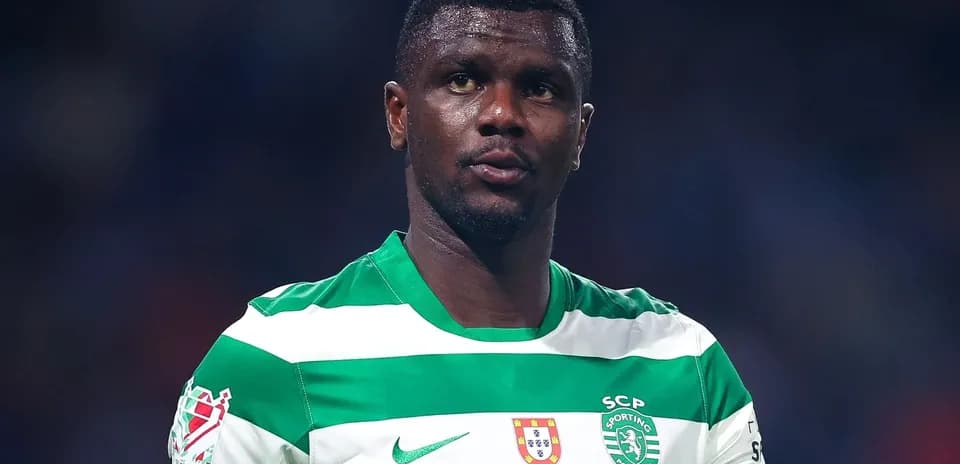 Player wearing green and white striped jersey