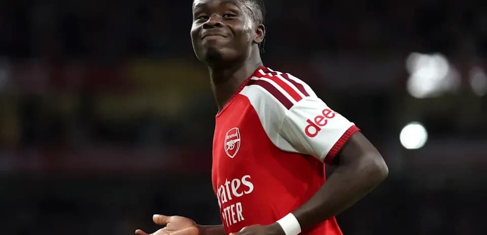 Player celebrating in Arsenal kit during match