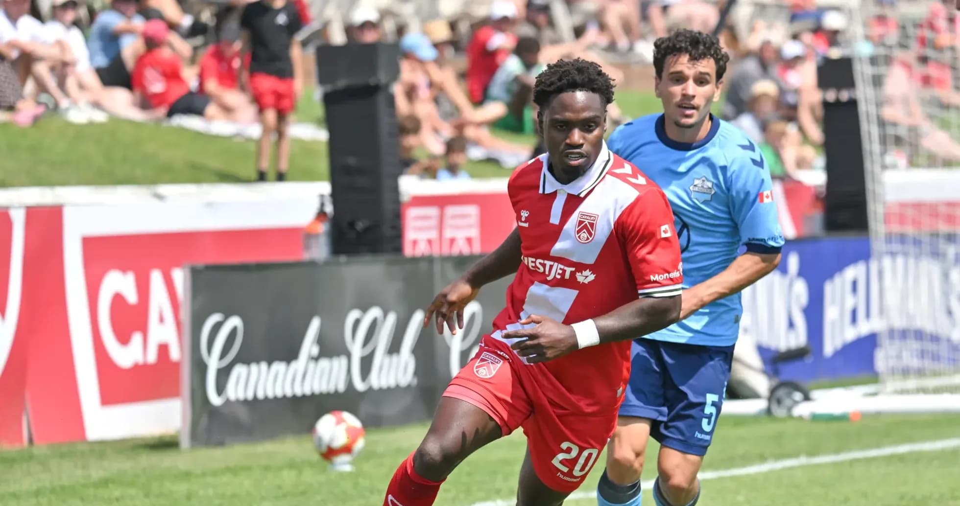 Players competing during HFX Wanderers vs Cavalry match
