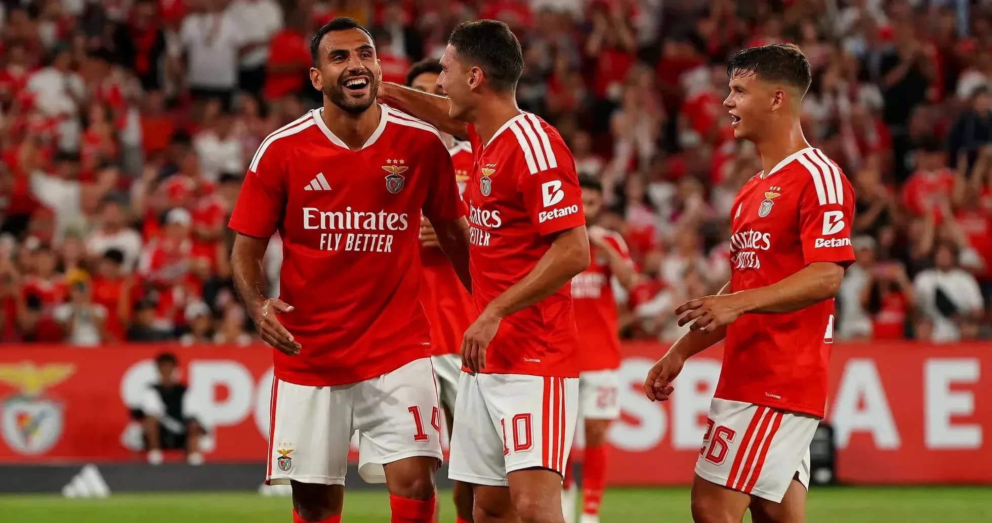 Benfica players celebrating during UEFA match