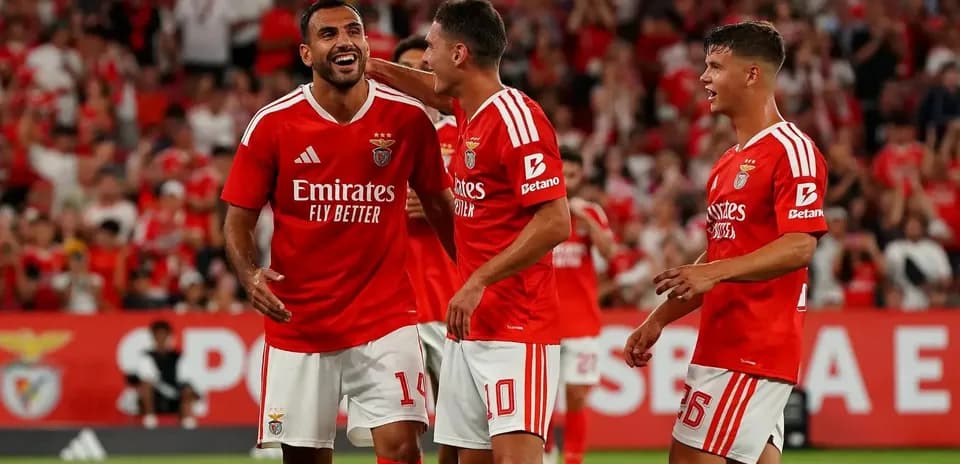 Benfica players celebrating during UEFA match