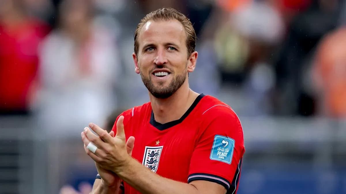 Player applauding while wearing England jersey Player applauding while wearing England jersey