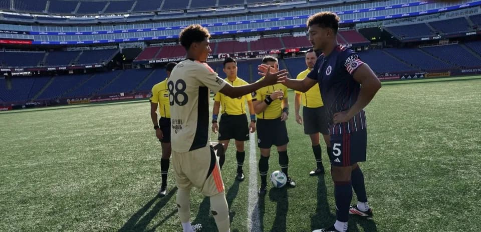 Team captains shaking hands before match