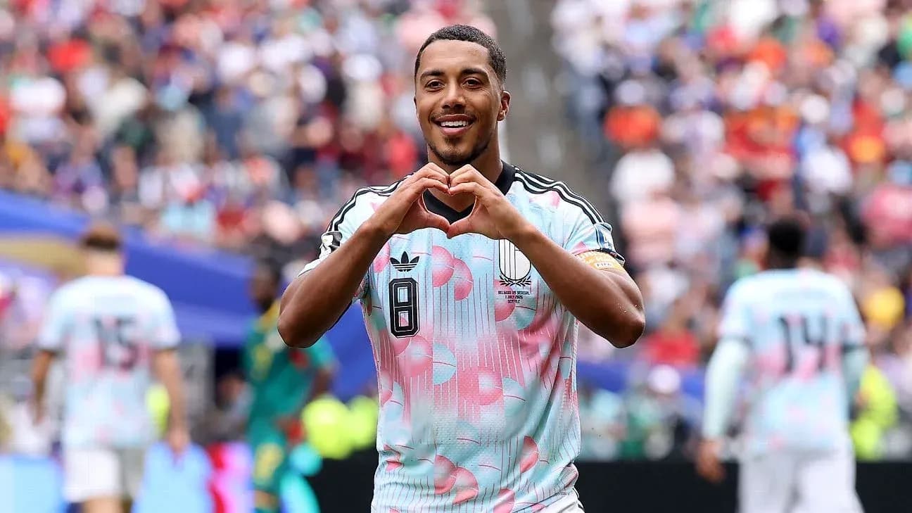 Player celebrating by making heart gesture after scoring