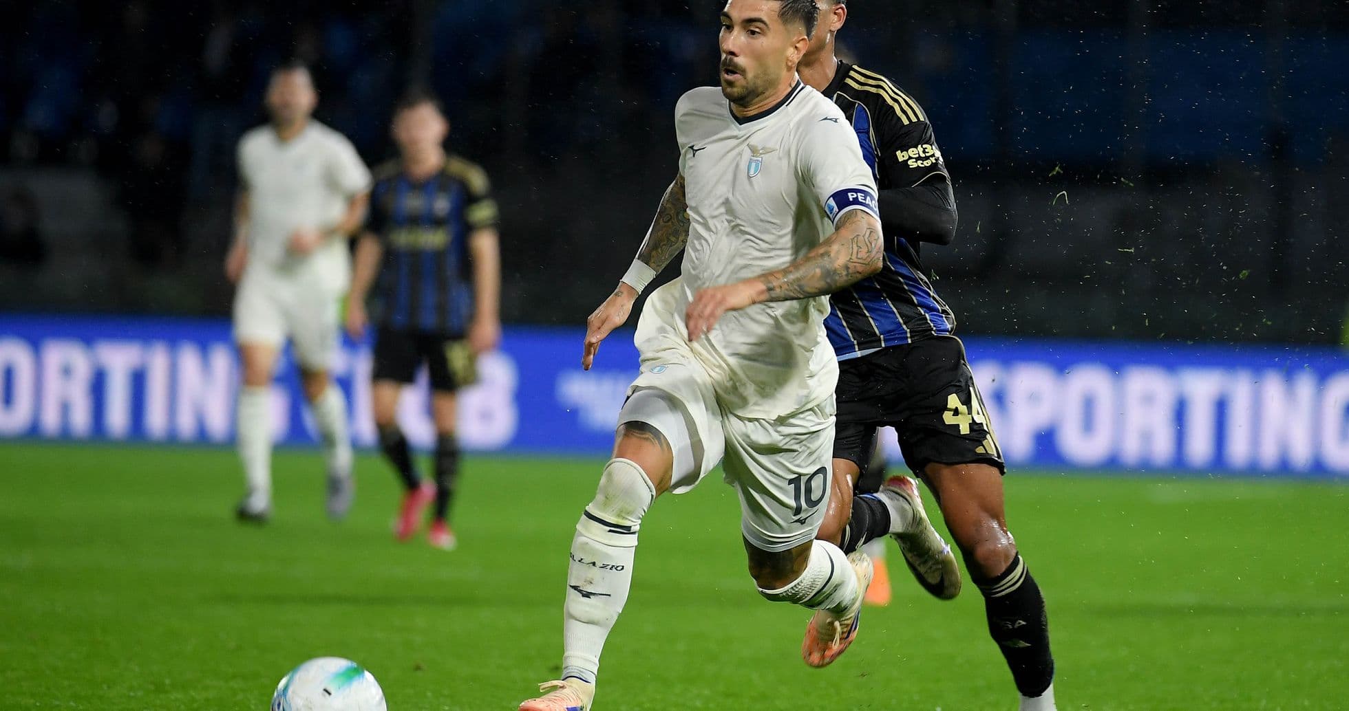 Lazio player sprinting during match against Pisa