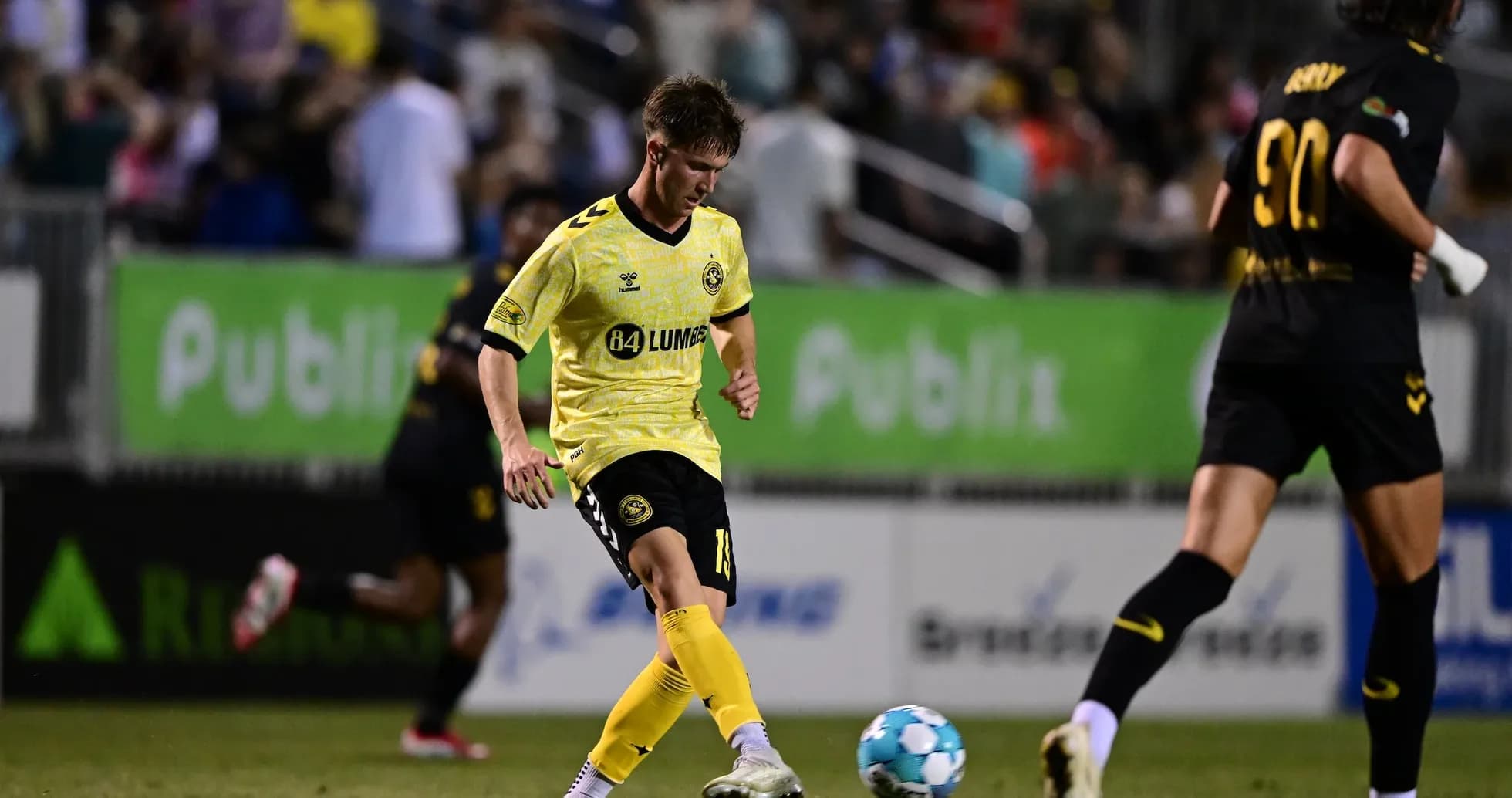 Player kicking the ball during Charleston Battery match