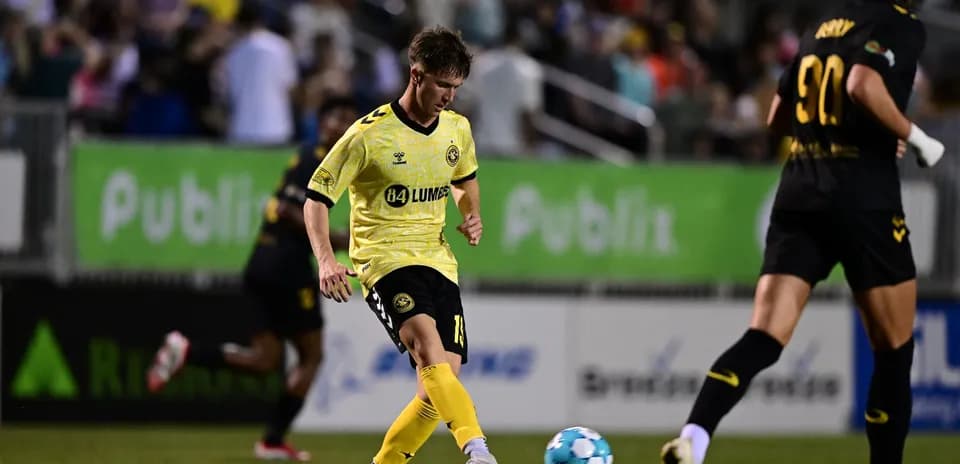 Player kicking the ball during Charleston Battery match