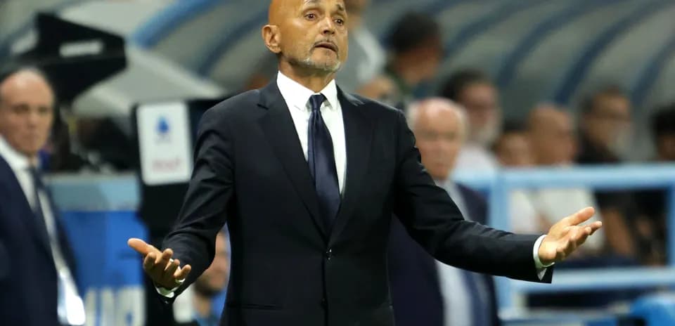 Coach gesturing during a match on the sidelines