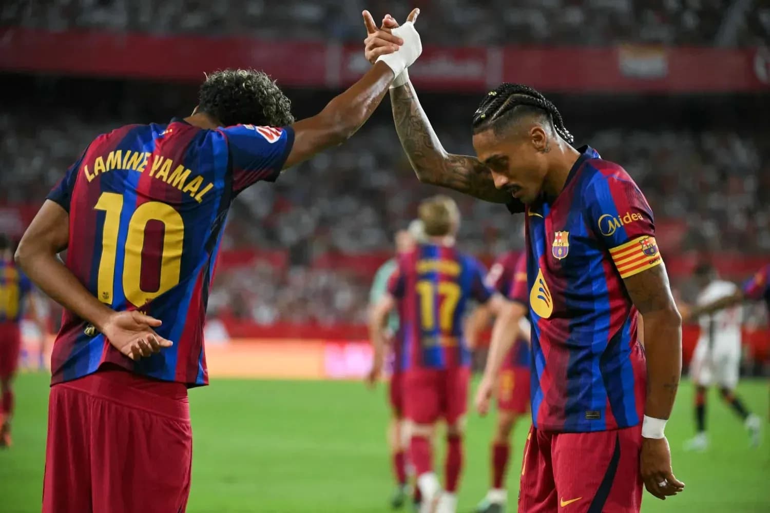 Barcelona players celebrating during Sevilla match
