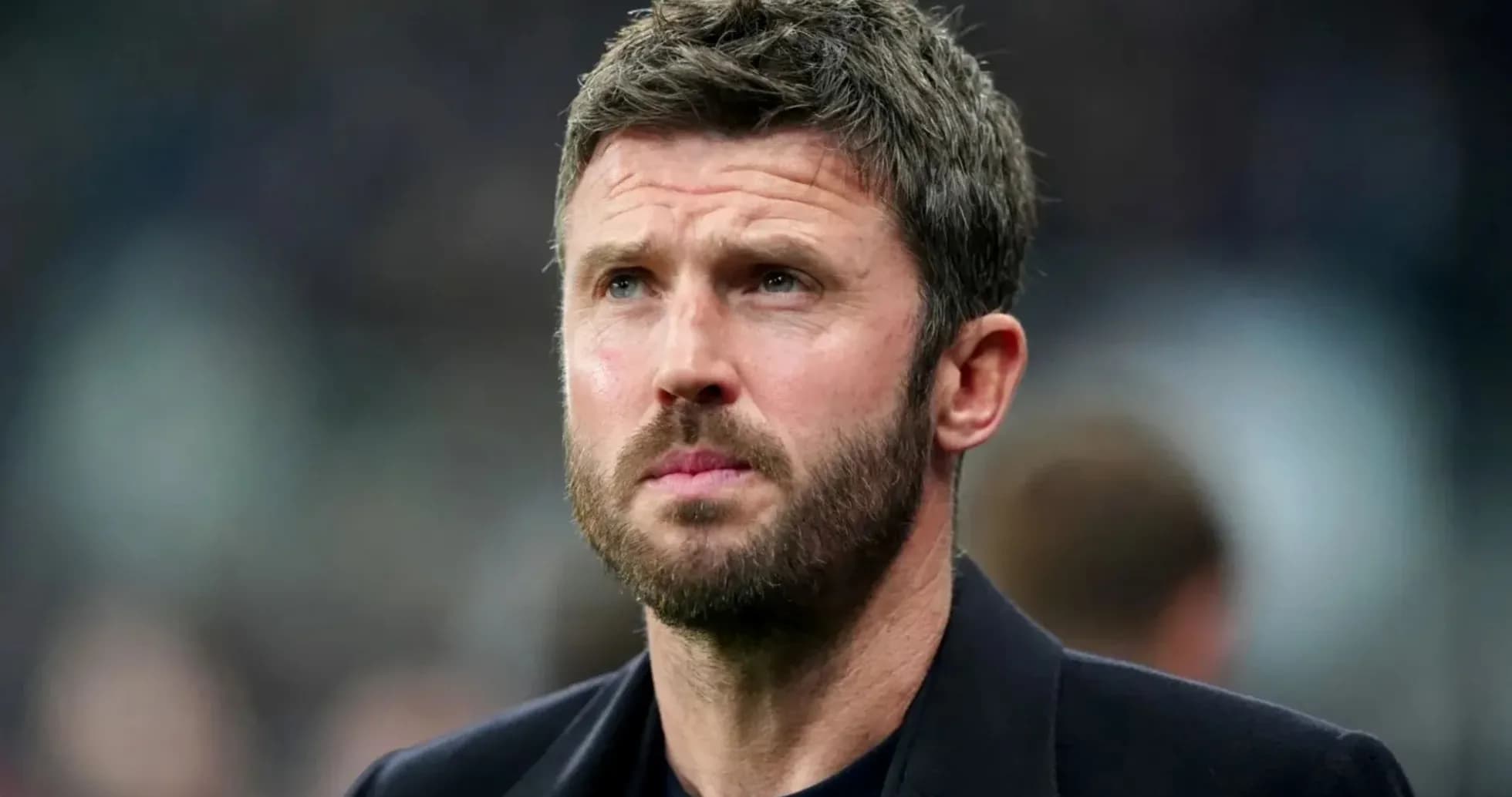 Coach looking intently during a match