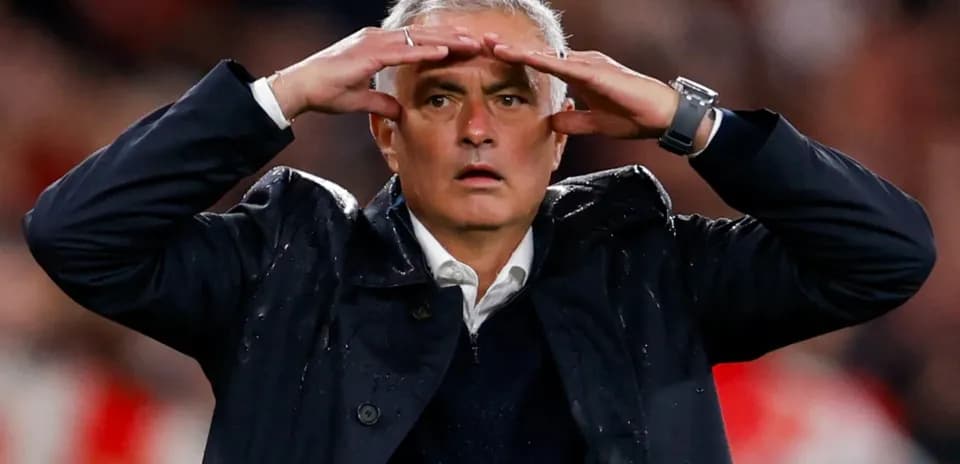 Coach signaling from the sidelines during a match