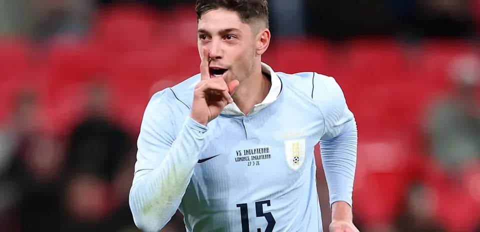 Player celebrating with finger on lips during match