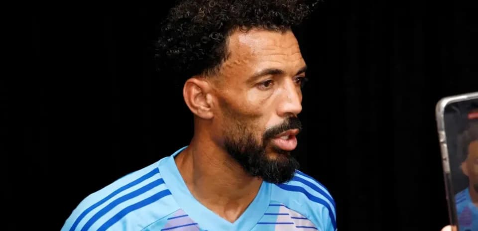 Player speaking during interview with media