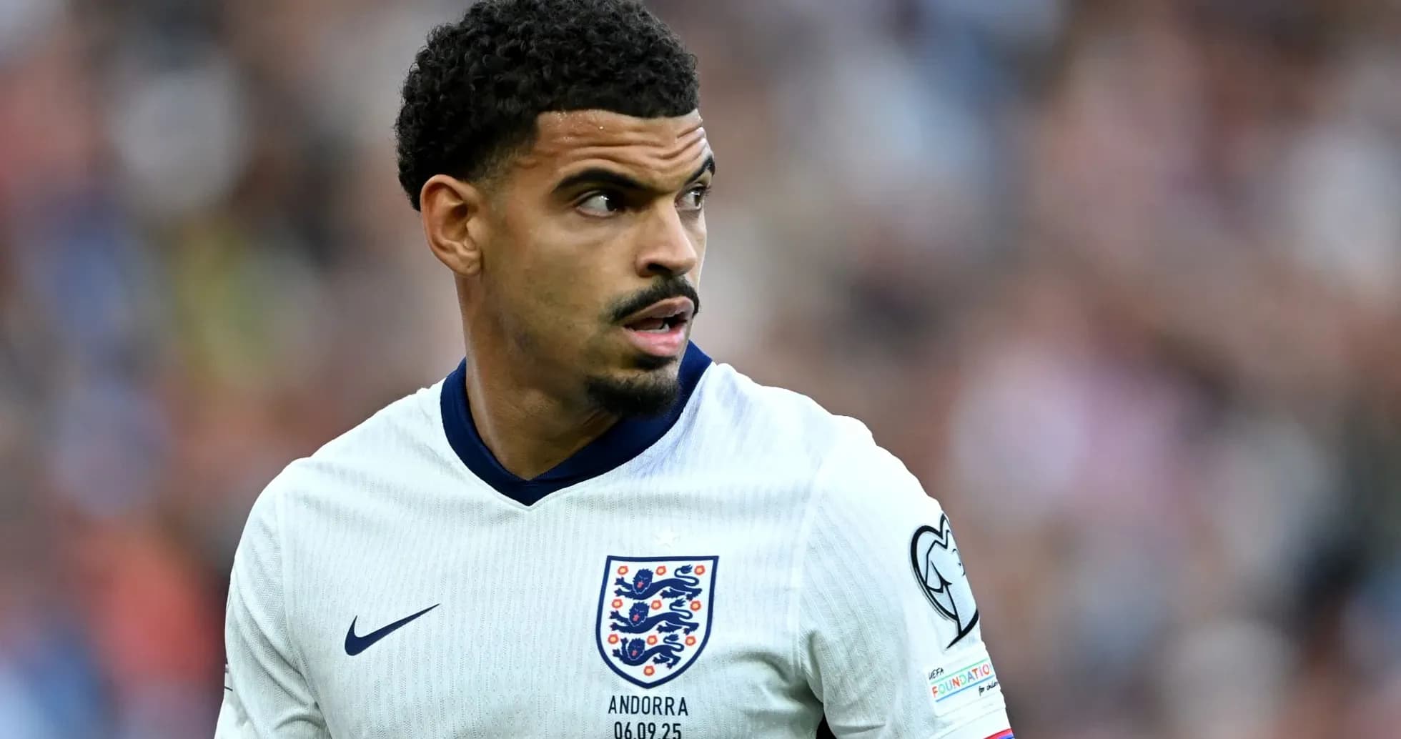 Player in England kit during football match