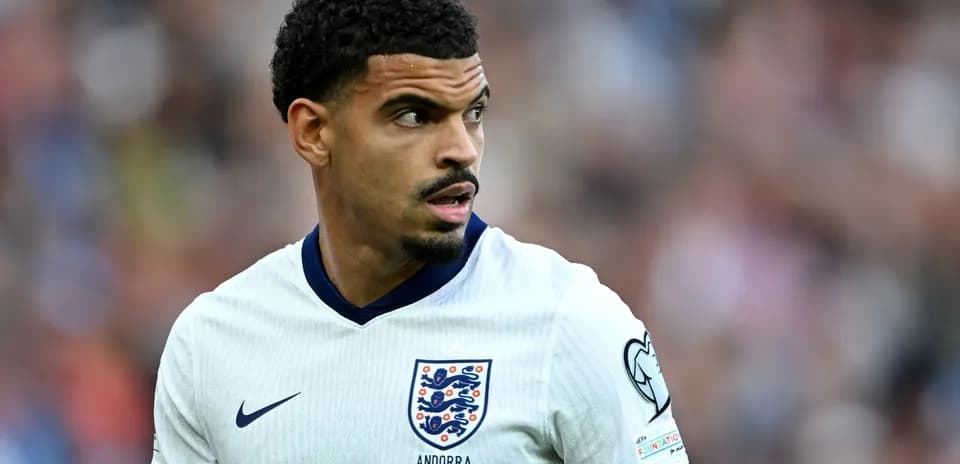 Player in England kit during football match