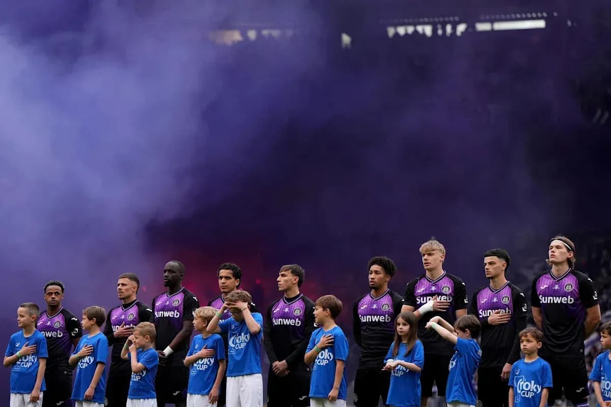 Players and children standing during pre-match ceremony
