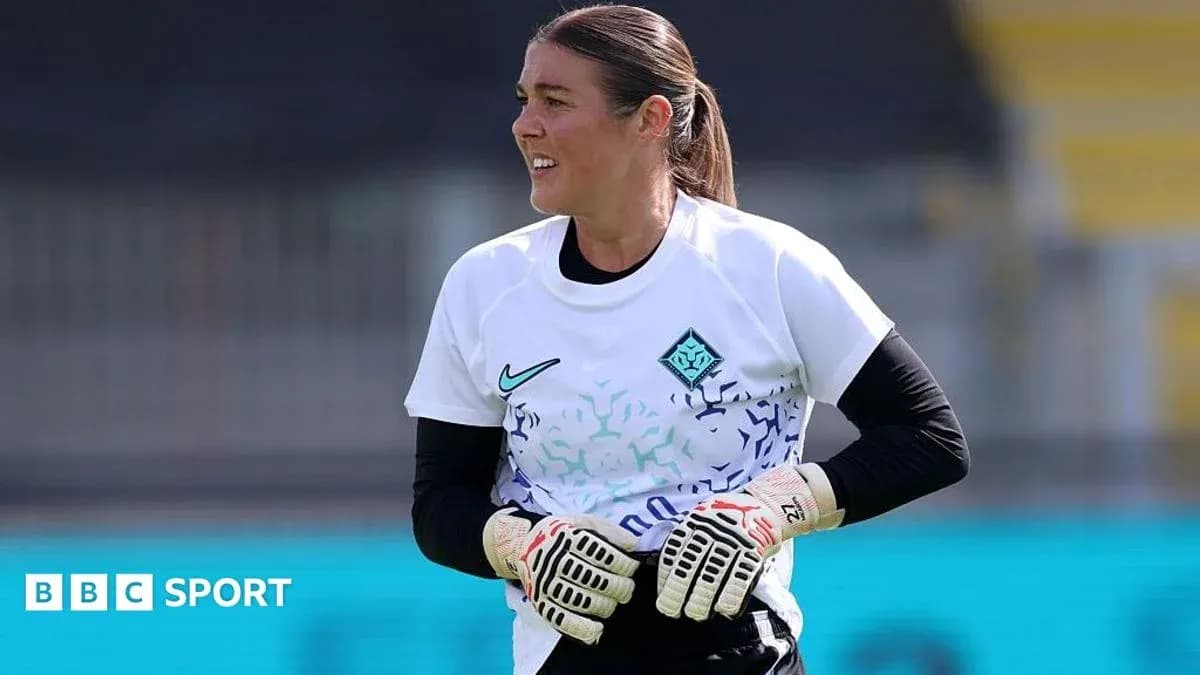 Goalkeeper in training gear preparing for practice