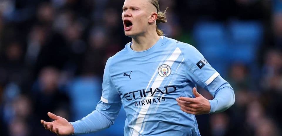Player reacting during match in light blue jersey