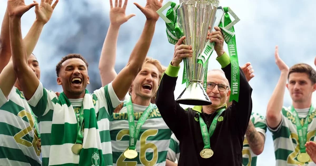 Team celebrating with trophy after winning championship
