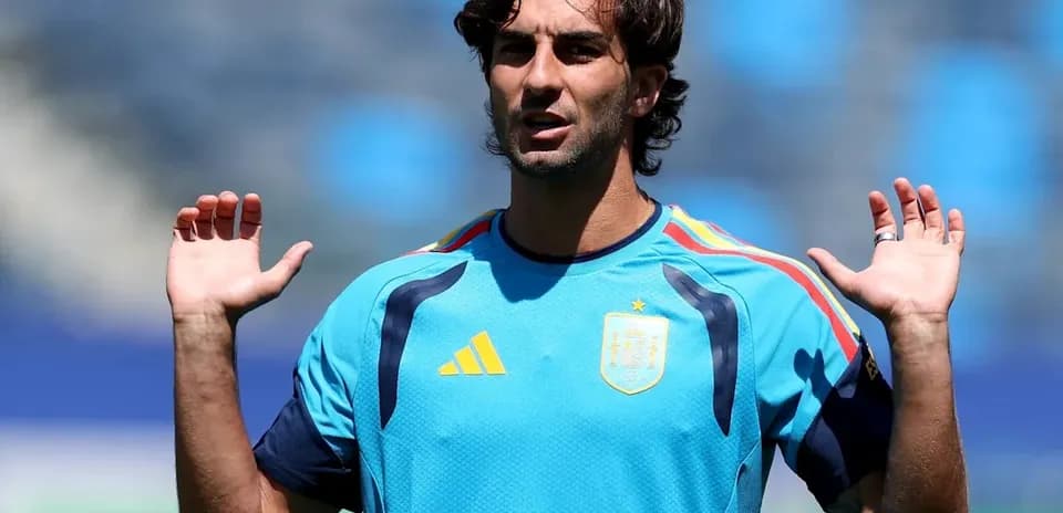 Player gesturing during training session in blue kit