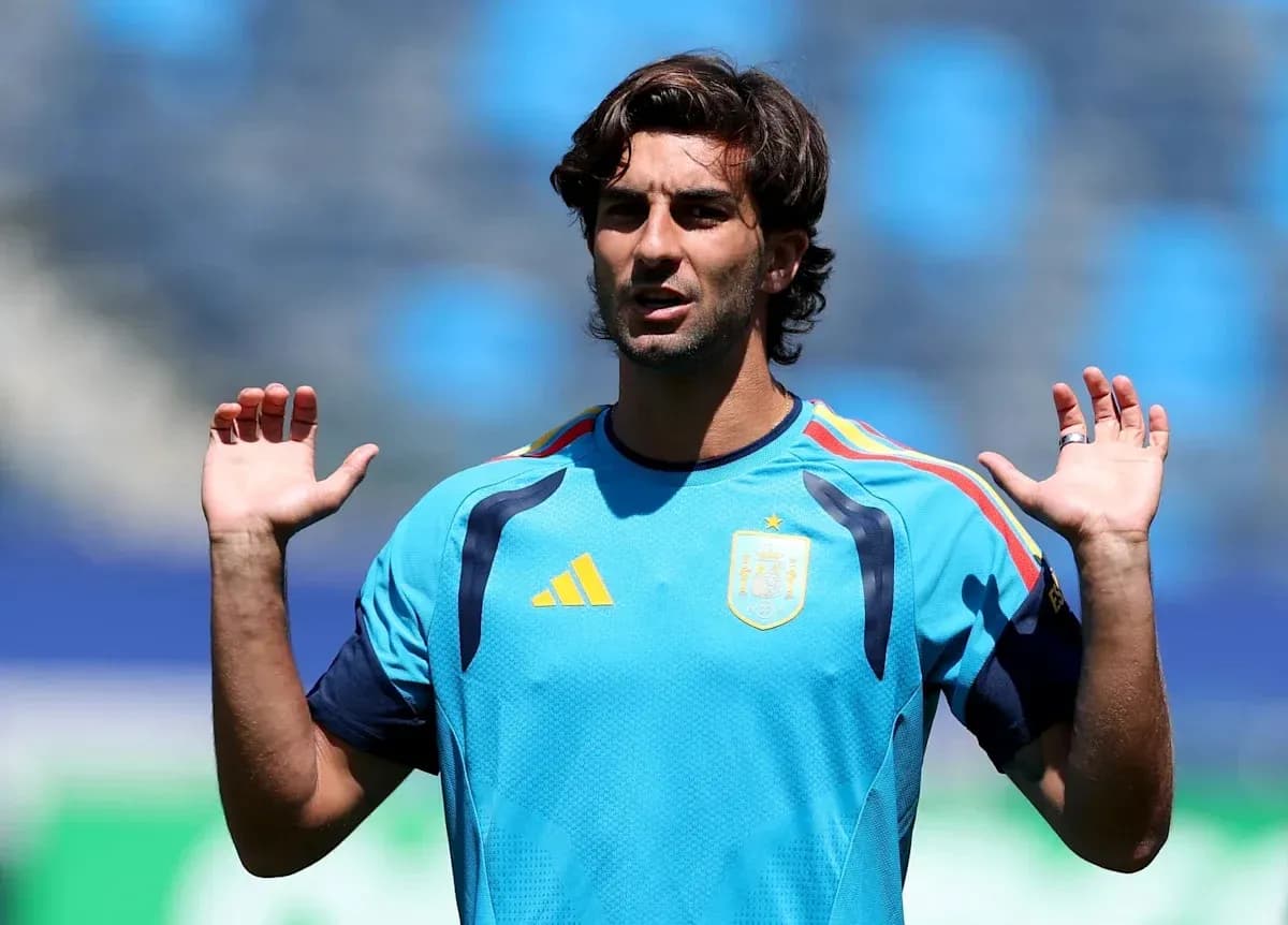 Player gesturing during training session in blue kit