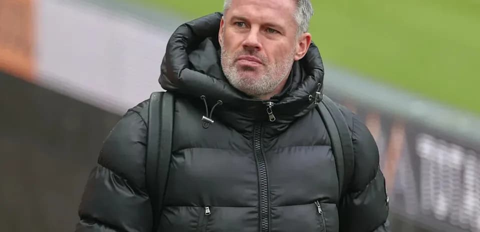 Person wearing a black puffer jacket walking