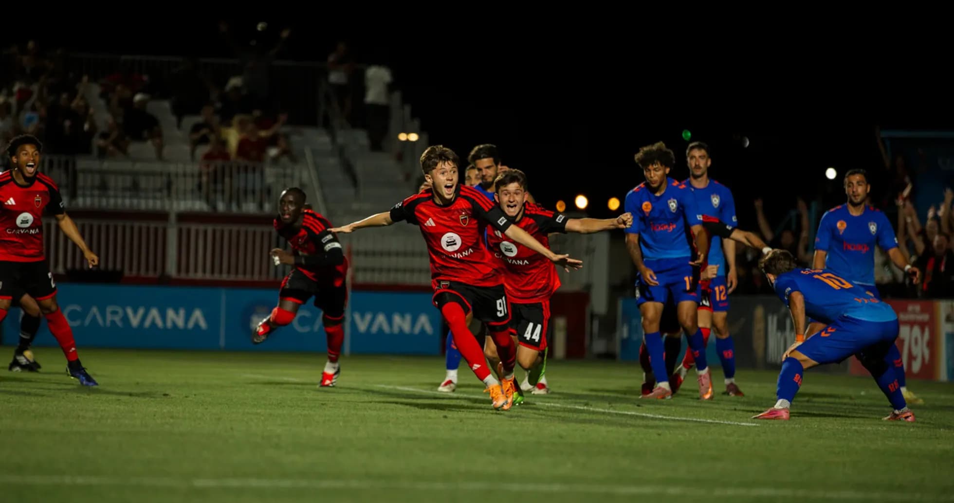 Players celebrating goal during El Paso vs Phoenix match