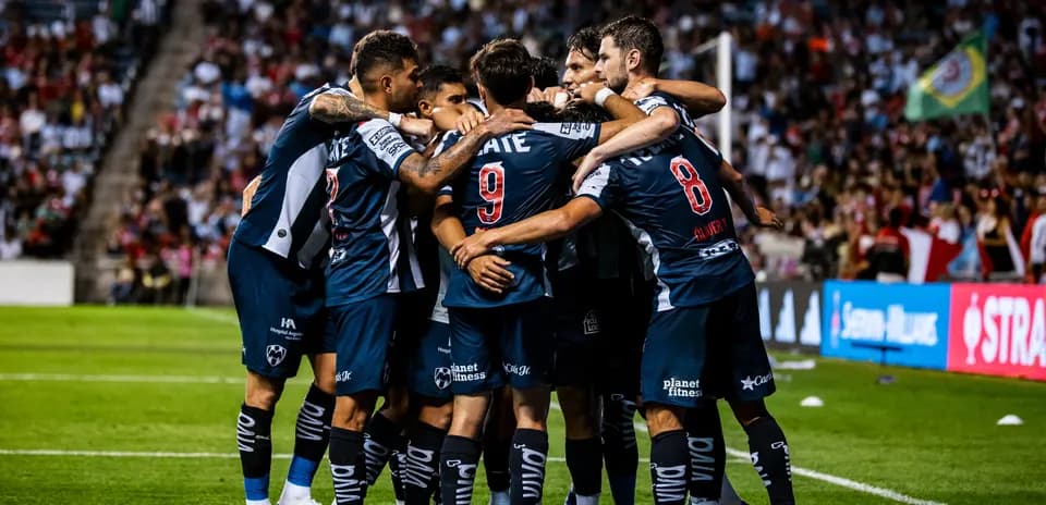 Monterrey players celebrating a goal during match