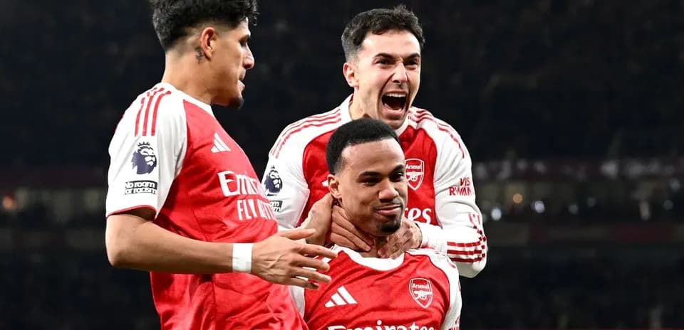 Arsenal players celebrating a goal during match