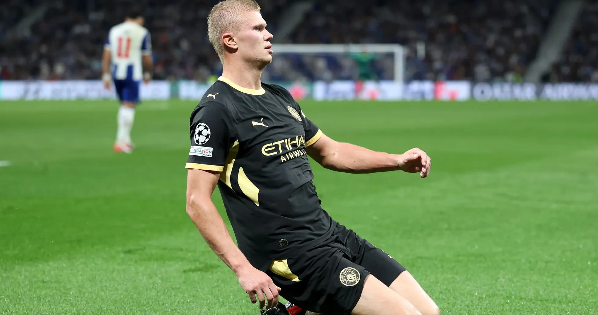 Player kneeling on pitch during UEFA Champions League match