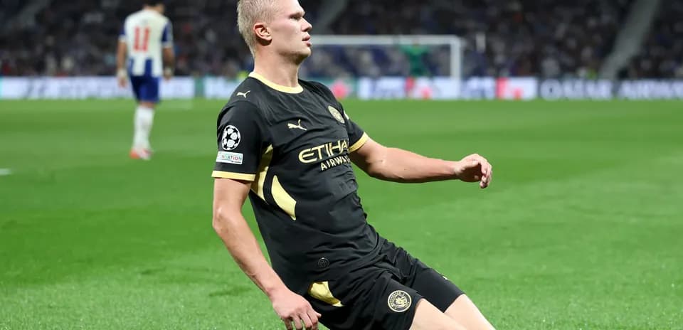 Player kneeling on pitch during UEFA Champions League match